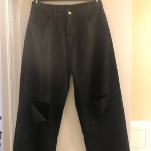 Oversized black ripped jeans